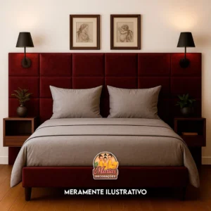Cama com cabeceira estofada vermelha.